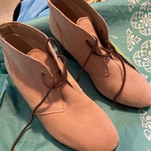 Bring new crocs shoes. Tan, size 9 1/2